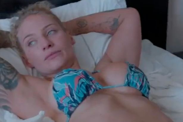 Ebanie Bridges massages boobs in skimpy bikini as she teases fans with raunchy video