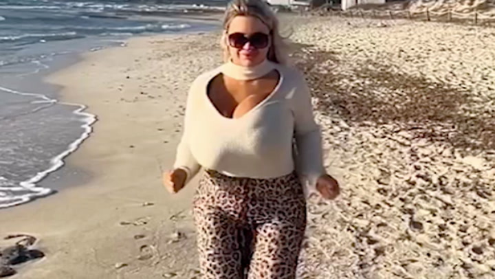 Model with 34N boobs recreates Baywatch scene – but fans beg her to ‘stop it’